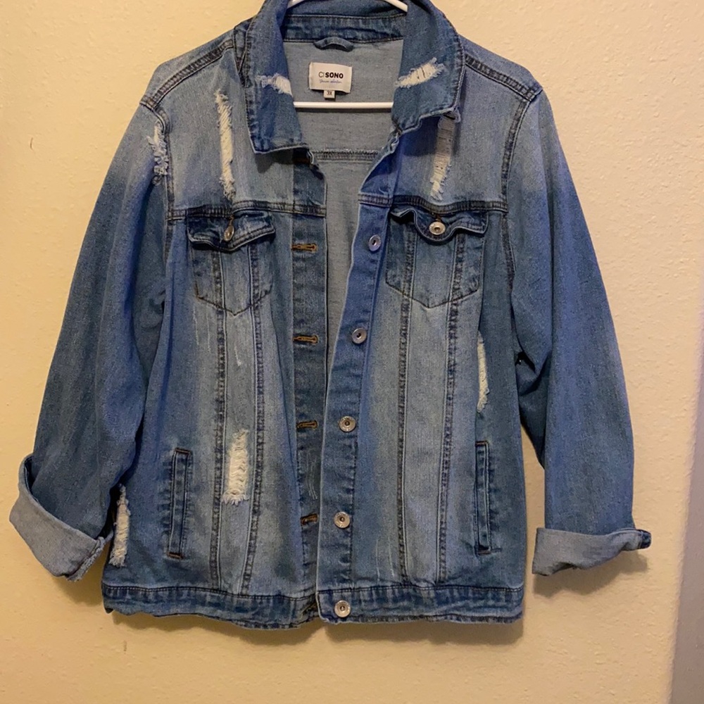 Distressed jean jacket